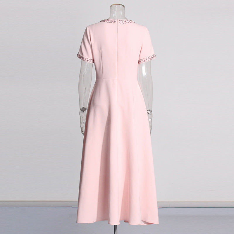 Helen – High-waisted dress with round neckline and rhinestone bow