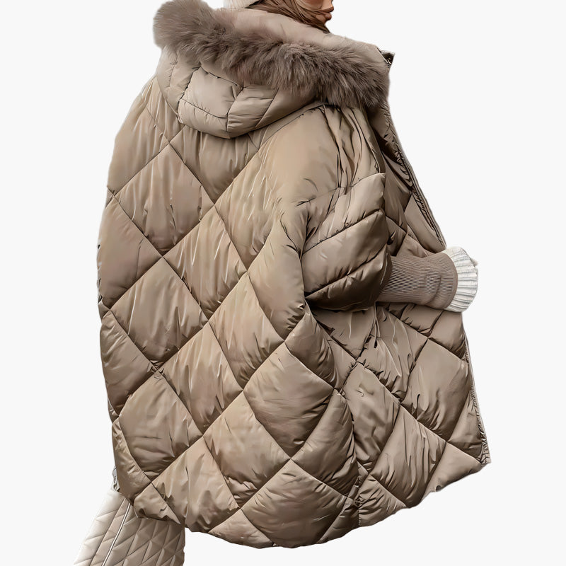 Women's winter quilted jacket with hood and oversize look – fashionable outdoor jacket for cold days
