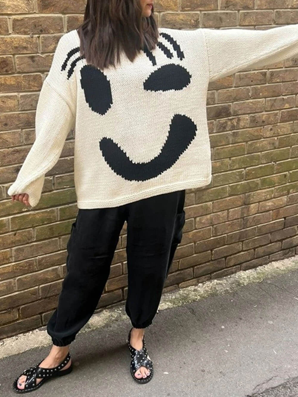 Women's sweater with playful face motif – knitted sweater in artistic style for leisure & everyday use