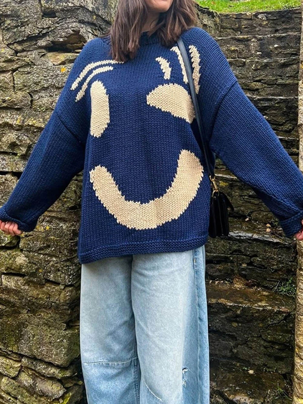 Women's sweater with playful face motif – knitted sweater in artistic style for leisure & everyday use