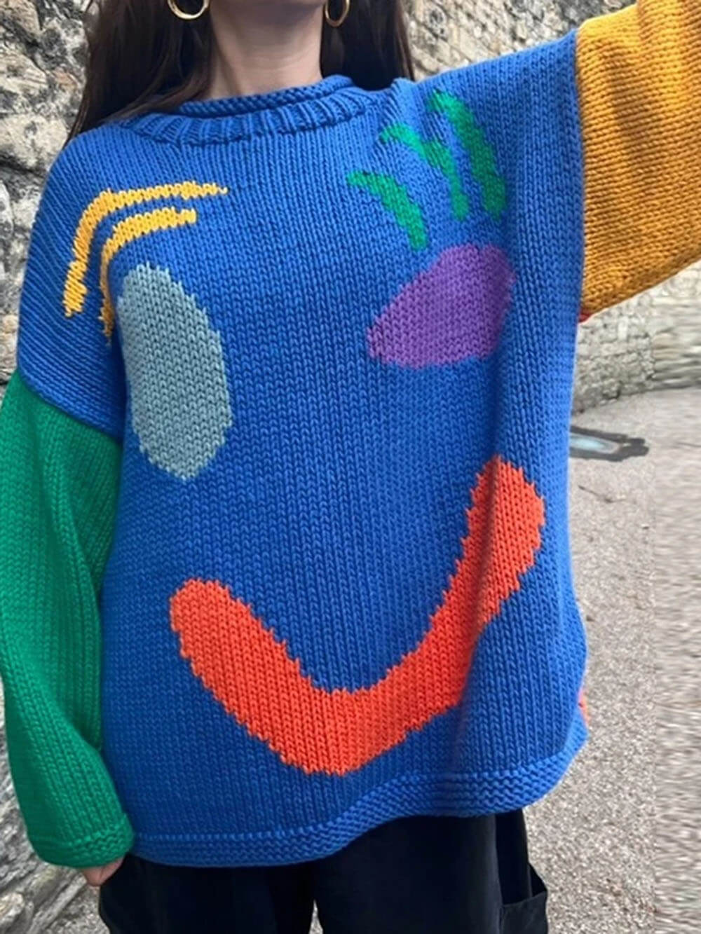 Women's sweater with playful face motif – knitted sweater in artistic style for leisure & everyday use