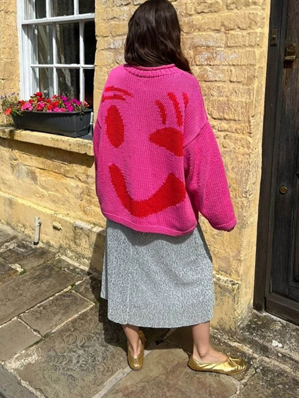 Women's sweater with playful face motif – knitted sweater in artistic style for leisure & everyday use