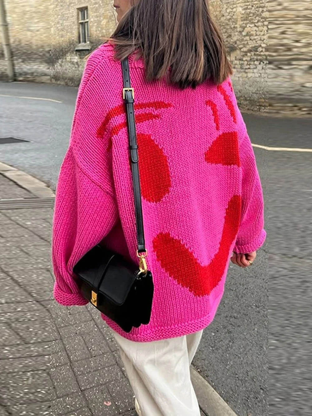 Women's sweater with playful face motif – knitted sweater in artistic style for leisure & everyday use