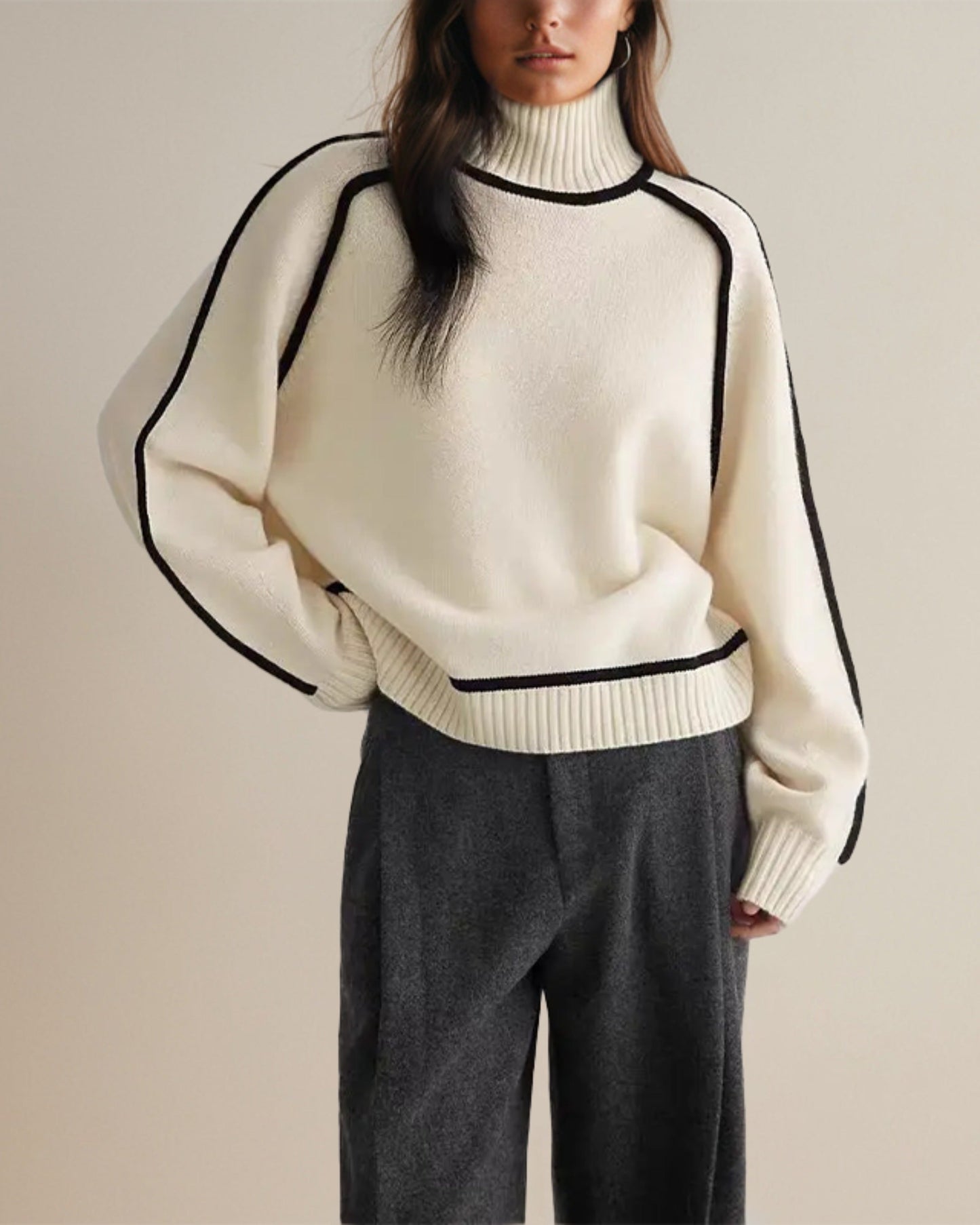 Women's turtleneck sweater in modern oversized style for autumn and winter