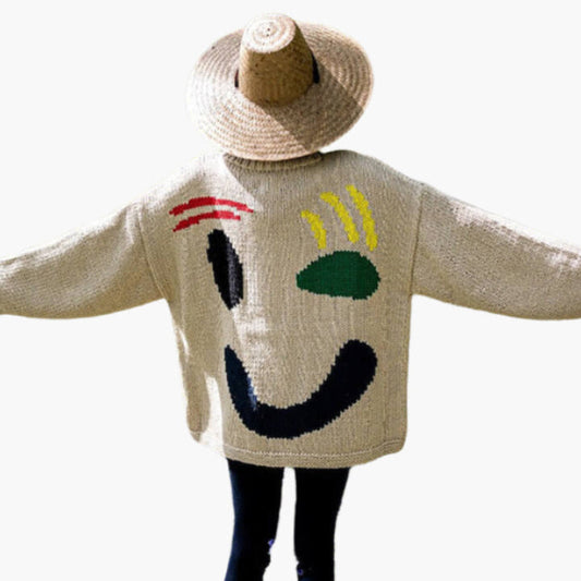 Women's sweater with playful face motif – knitted sweater in artistic style for leisure & everyday use