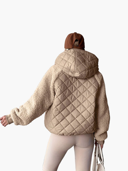 Women's quilted jacket with hood and teddy fur sleeves – fashionable transitional jacket for everyday and leisure use