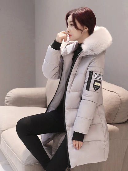 Women's winter quilted coat with hood, fashionable and warm – ideal for cold days