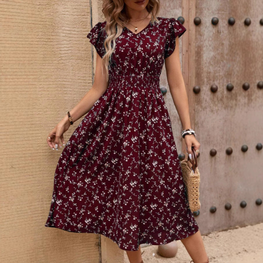 Susan – Elegantes Damenkleid mit V-Ausschnitt, Gürtel und Rüschensäumen