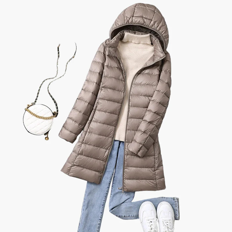 Women's winter quilted coat with hood – fashionable long coat for everyday and outdoor use