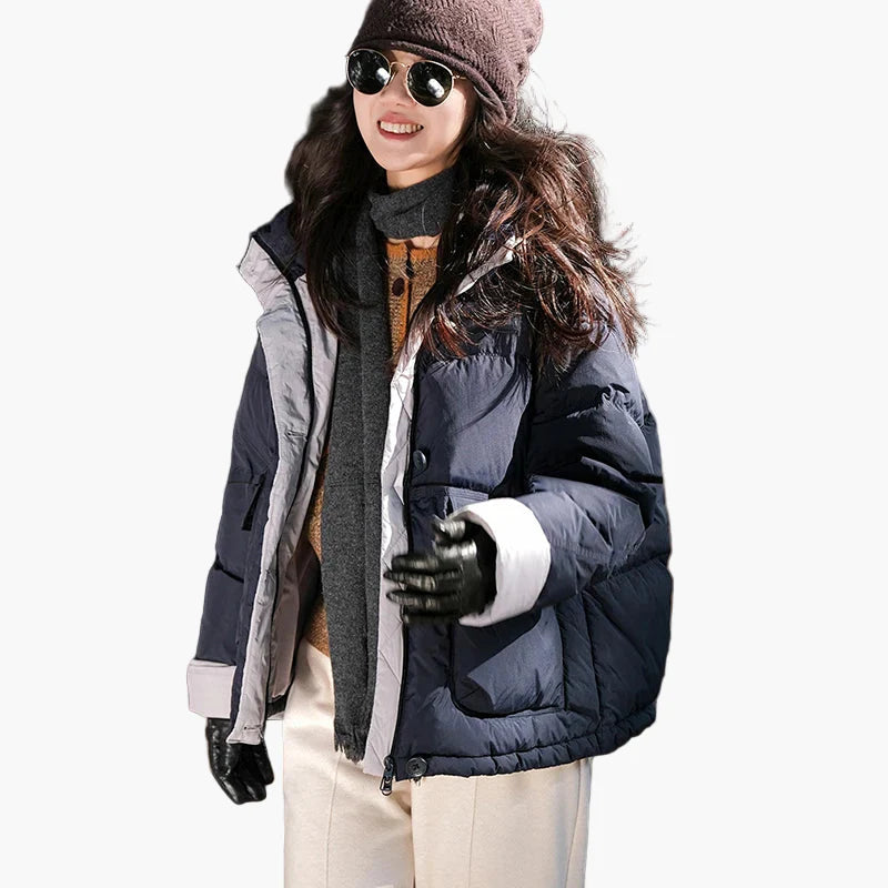 Women's winter quilted jacket with hood, fashionably loose, ideal for everyday and outdoor use