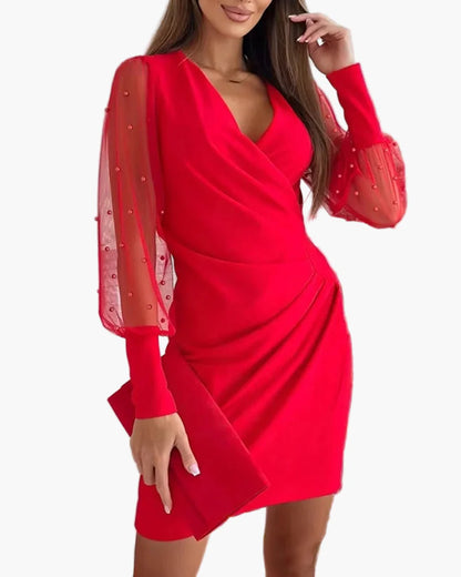 Ladies elegant evening dress with wrap look and transparent sleeves – perfect for special occasions