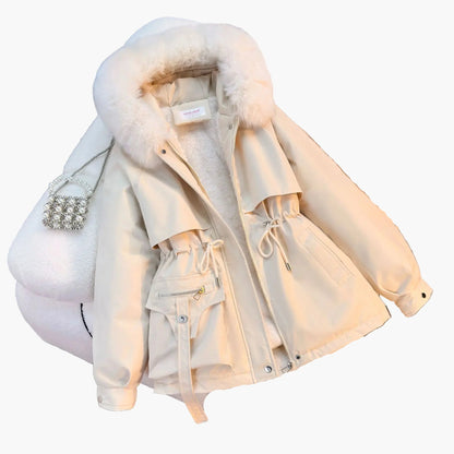 Women's winter jacket with hood and detachable faux fur collar – fashionable outdoor parka for cold days