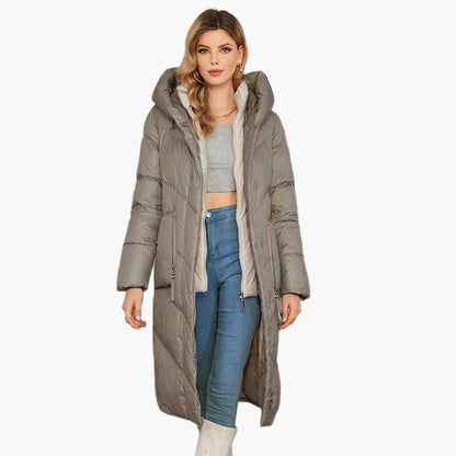Women's winter quilted coat with hood – fashionable long parka for cold days