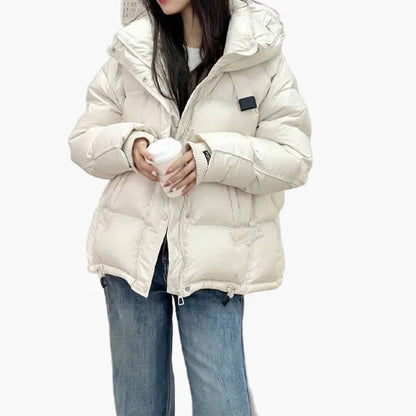 Women's winter quilted jacket with hood – fashionable warm outdoor jacket for everyday and leisure use