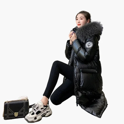 Women's winter quilted coat with hood and fur collar – elegant, long puffer for cold days