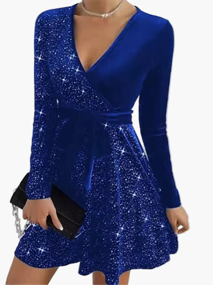 Women's festive party dress with glitter and bow – elegant look for special occasions