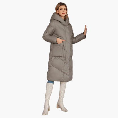 Women's winter quilted coat with hood – fashionable long parka for cold days