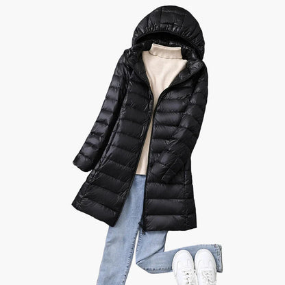Women's winter quilted coat with hood – fashionable long coat for everyday and outdoor use