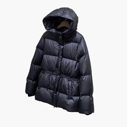 Women's winter quilted jacket with hood – fashionable outdoor jacket for cold days