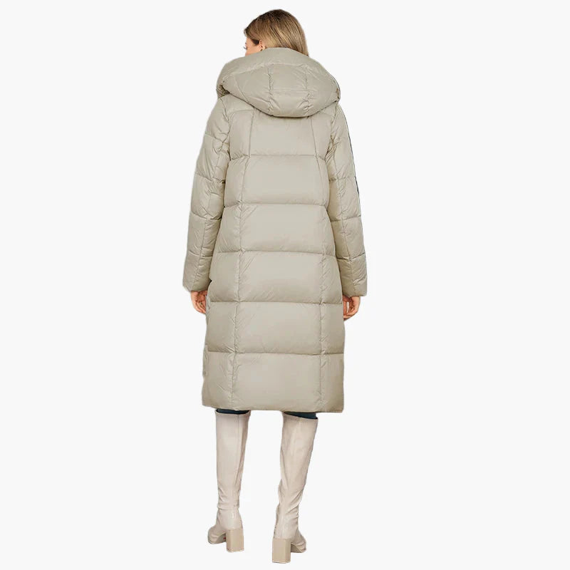 Women's winter quilted coat with hood – fashionable long parka for cold days